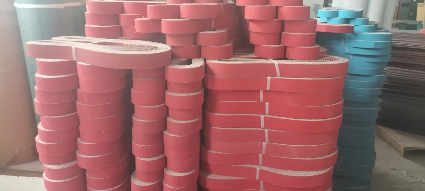 Converted industrial sanding belts prepared in a production batch