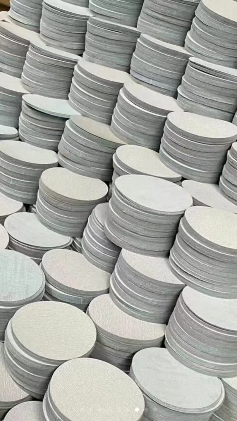 Unbranded abrasive disc batches prepared for processing